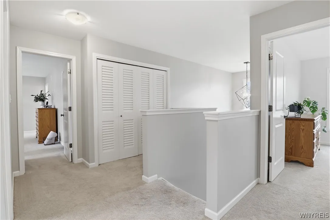 2nd Floor Landing with Bifold Doors for Laundry Space