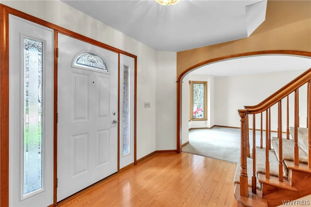Foyer with hardwood floors