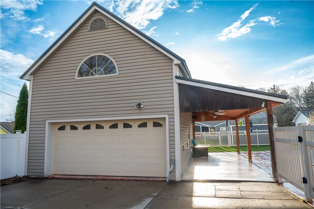 This garage holds two vehicles comfortably as well as a great amount of storage up and down.