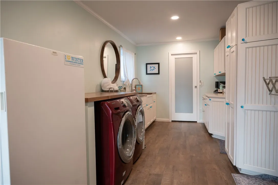 This room was completely added on to one year ago. All new floors, sinke , windows doors