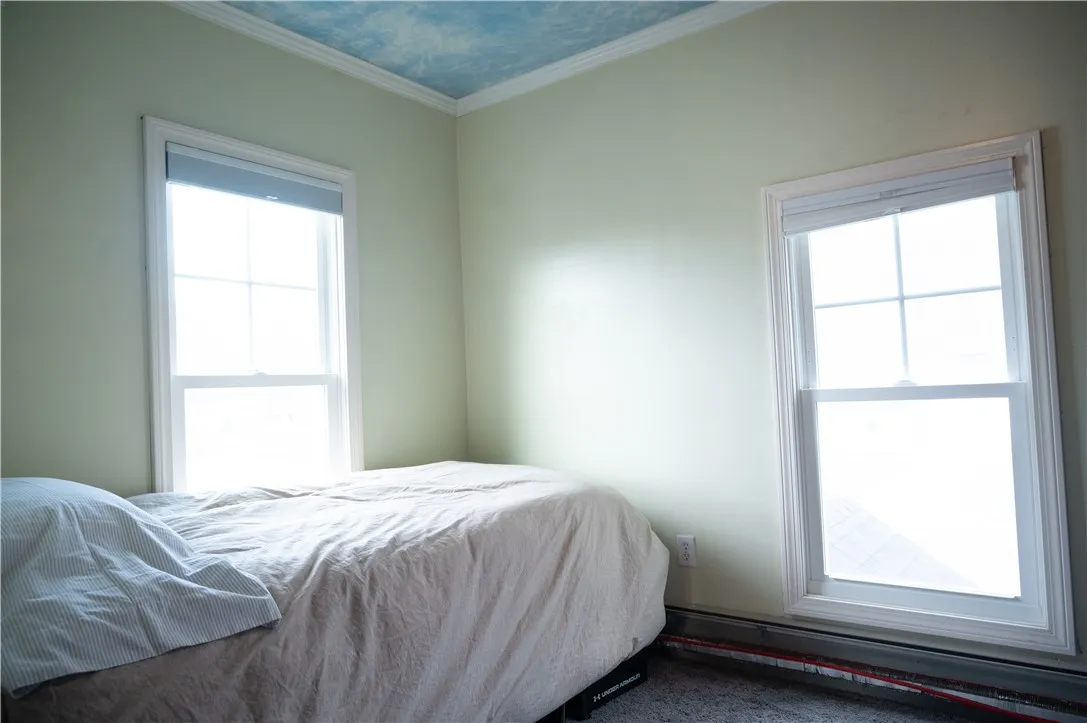 third bedroom upstairs with built in storage