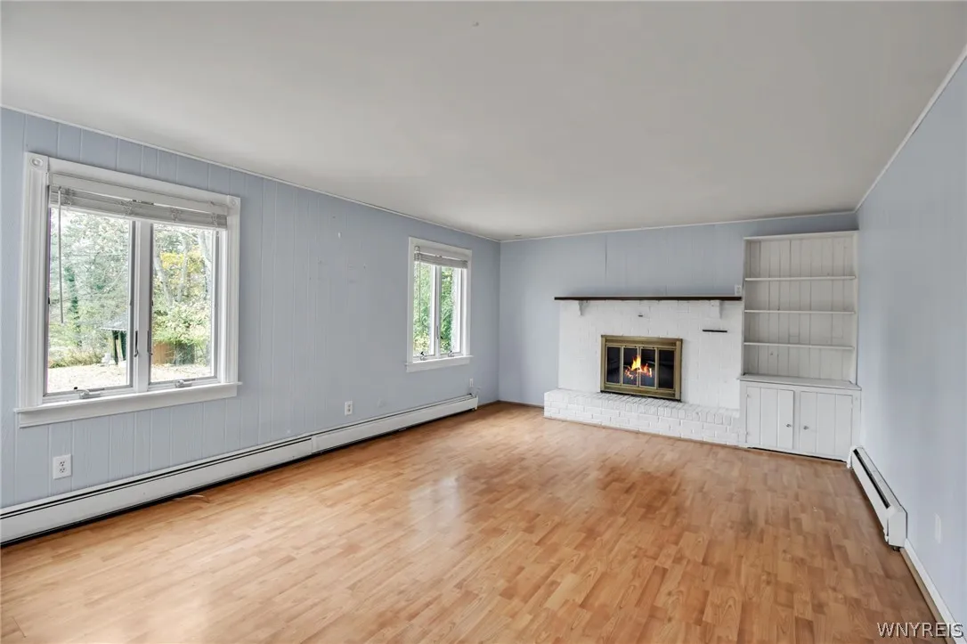 Family room with woodburning fireplace