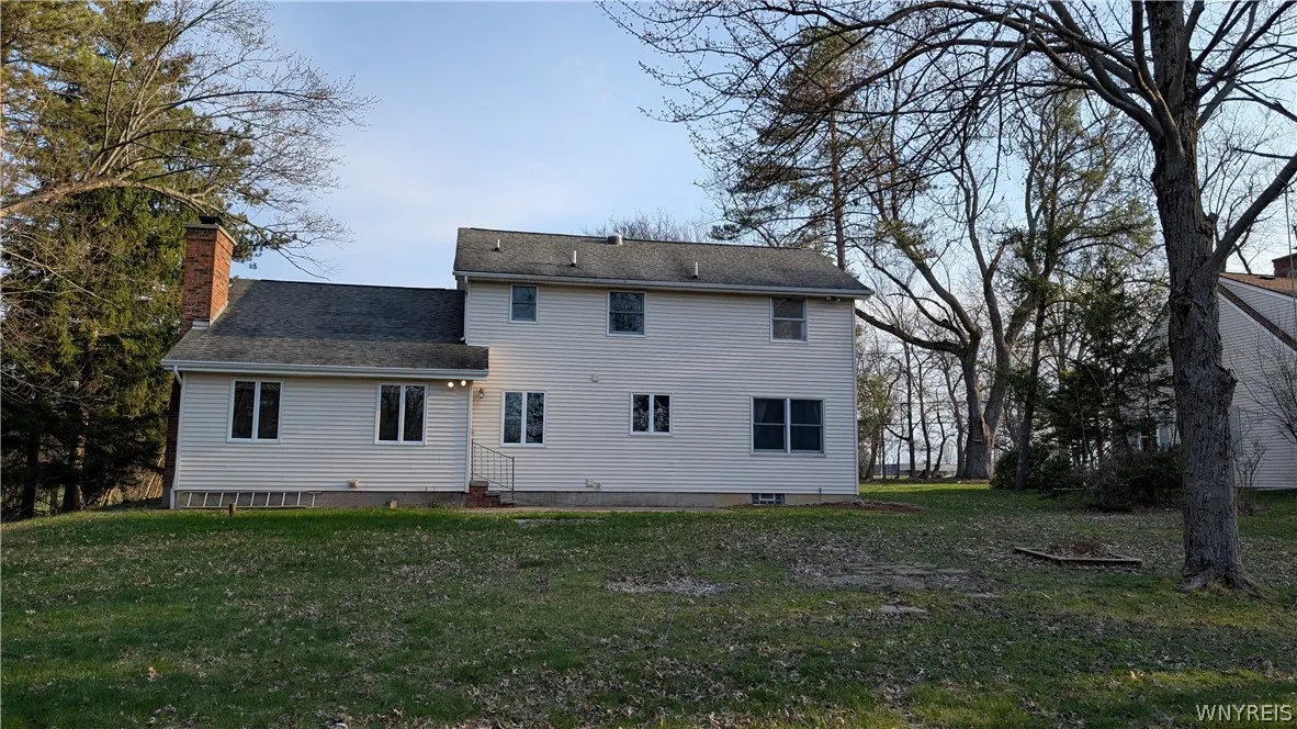 Concrete patio off the back of the home