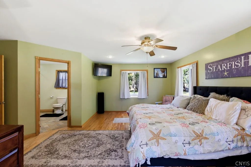 Primary bedroom suite with attached full bath.
