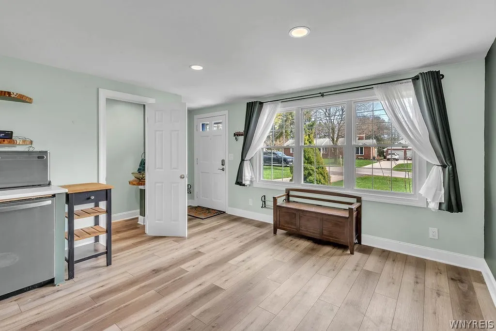 Half Bath Entry from Front Part of Open Kitchen