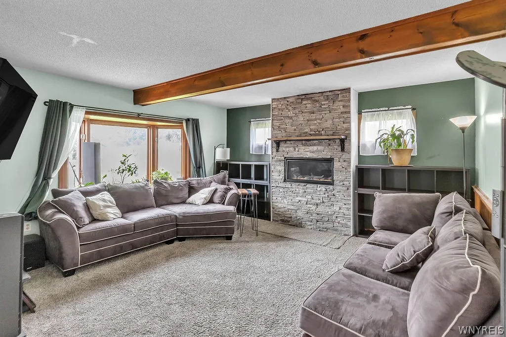 Living Room with Gas Fireplace and Built-In Shelves