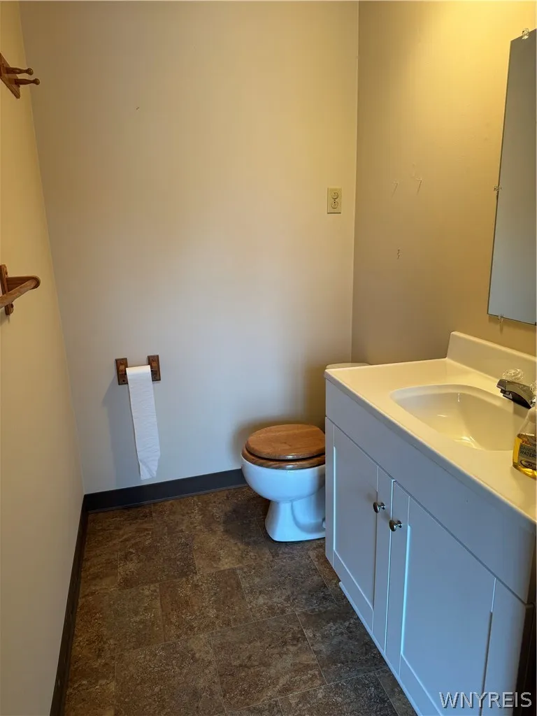 Updated half bath off the family room and kitchen