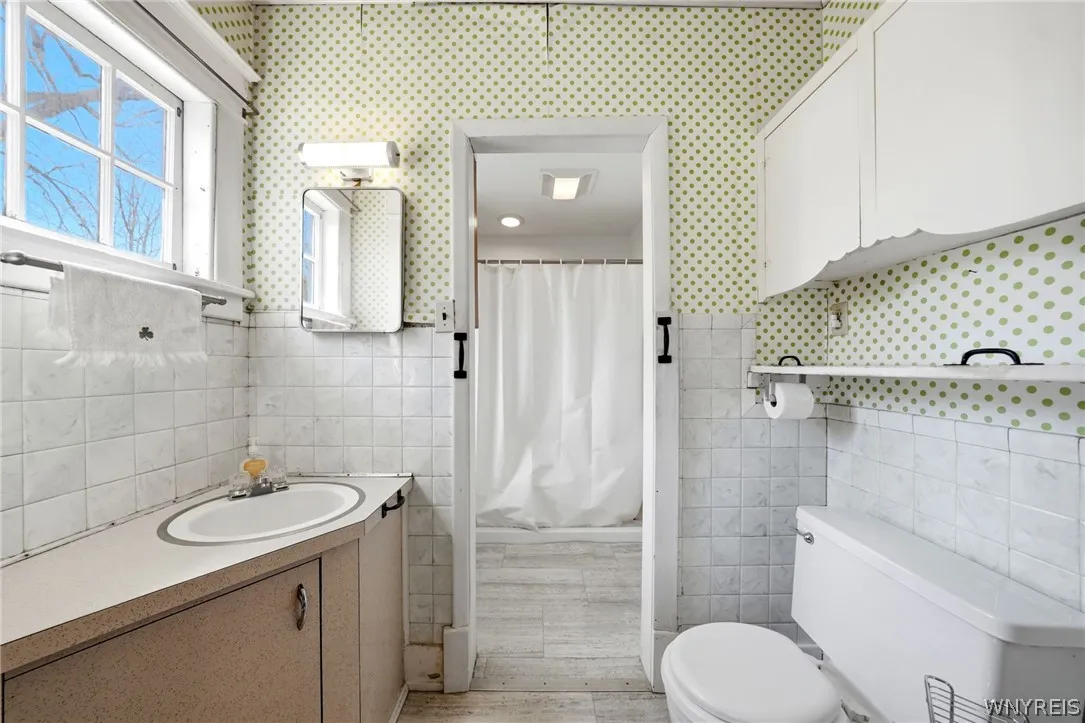 First floor bedroom leads to this full bath