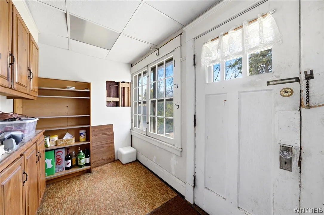 Mud room off kithchencan easily be converted to a first floor laundry or a half bath