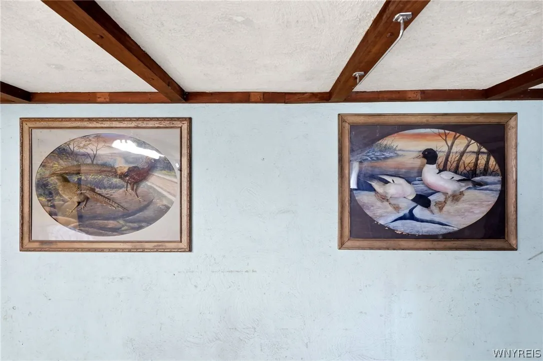 Built into the wall.  These pieces of art work are not only a conversation piece but also convey with the property