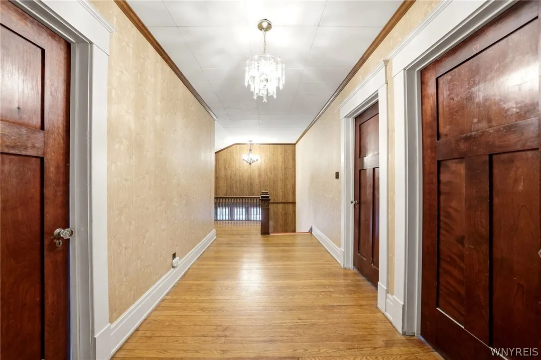 Floors and doors are a rare find in upper hallway