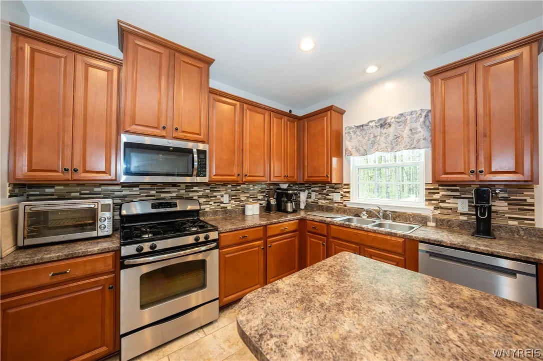 75 Hilltowne Drive, Orchard Park, New York 14127, Orchard Park, New York 14127, 4 Bedrooms Bedrooms, 9 Rooms Rooms,2 BathroomsBathrooms,Residential,For Sale,75 Hilltowne Drive, Orchard Park, New York 14127,0,B1678196