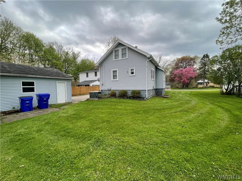 rear elevation, garage, yard