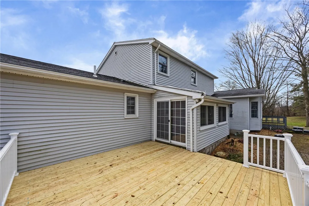 New Deck and railing to enjoy the summer breezes and cookouts on
