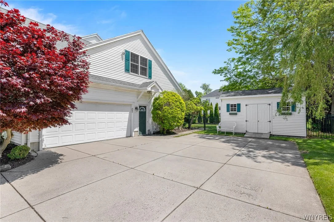 Oversized SHED, conveniently located @ end of driveway!