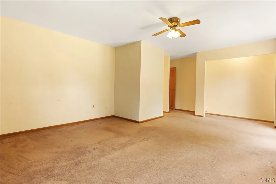 There is a ton of space in the primary suite. Notice the lighted area that is perfect for a home office