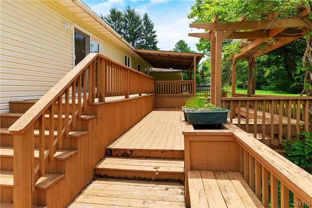 the expansive deck let's you enjoy your yard from every angle