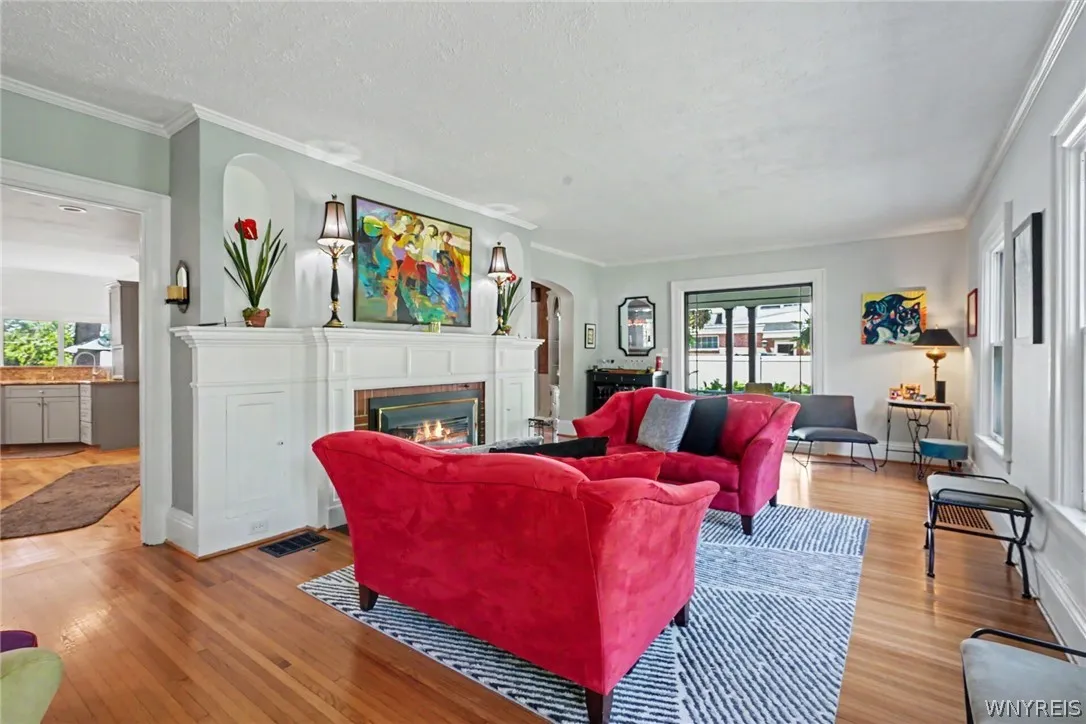 LIVING ROOM WITH GAS FIREPLACE-HARDWOOD FLOORS