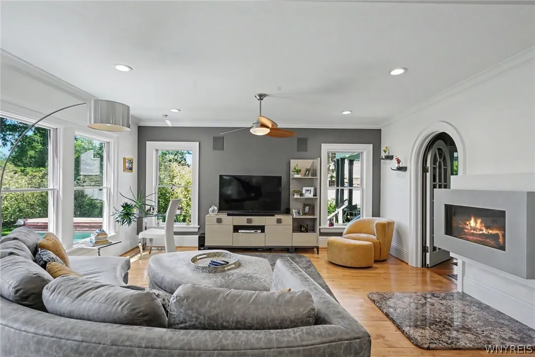 CONTEMPORARY FEEL IN FAMILY ROOM WITH GAS FIREPLACE