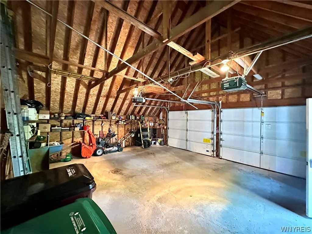 2.5 car garage has upper storage in the back