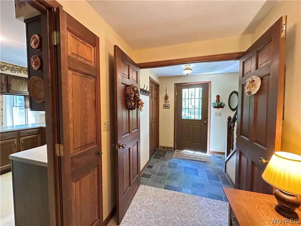 Looking into entryway from hall.