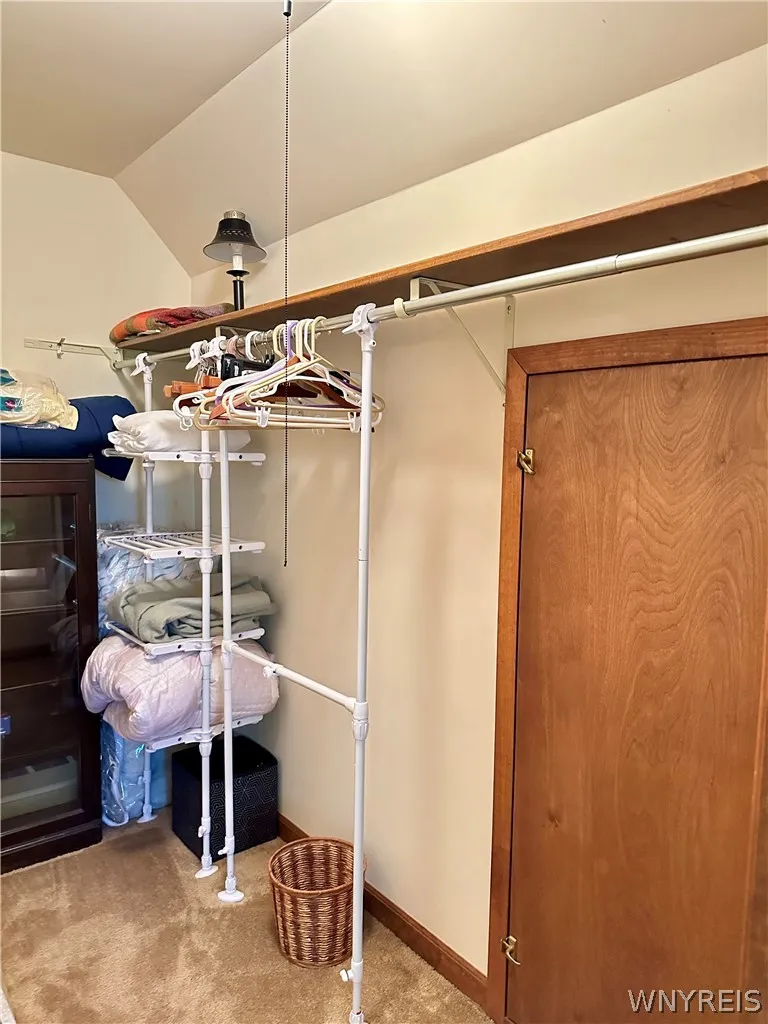 In-law suite walk-in closet- access to other crawl space.