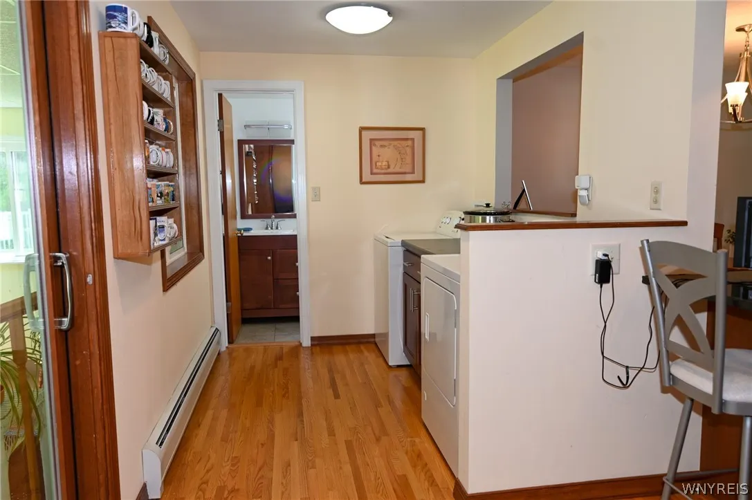 Half bath, next to washer and dryer
