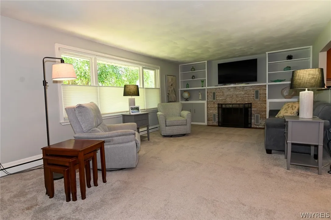 Living room. Window shades can be down all the way, down from top and up from bottom