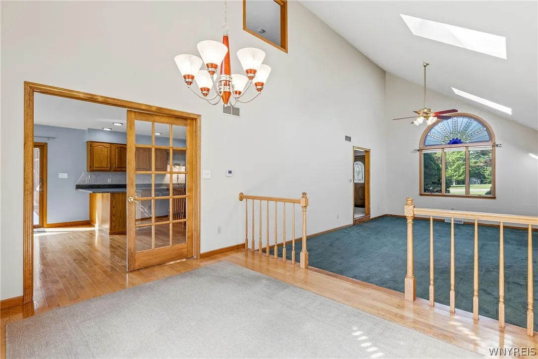 view from dining room to kitchen eating area