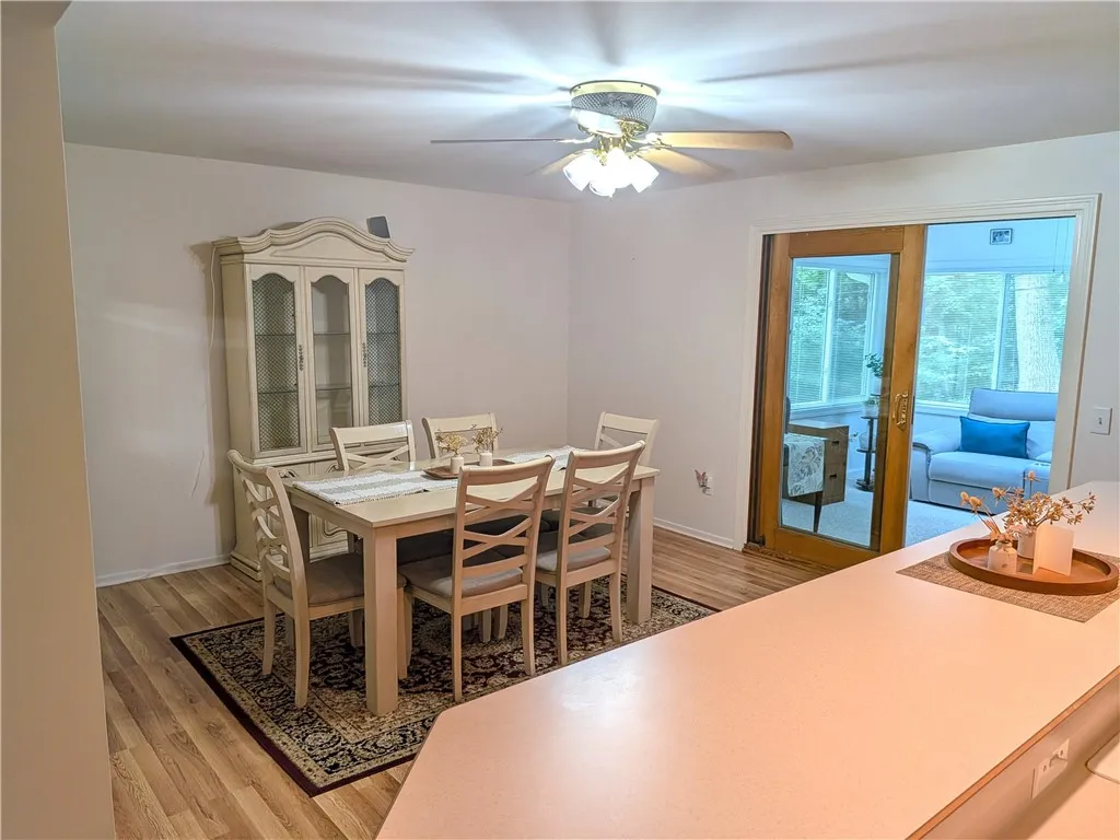 Dining area off kitchen / next to sunroom