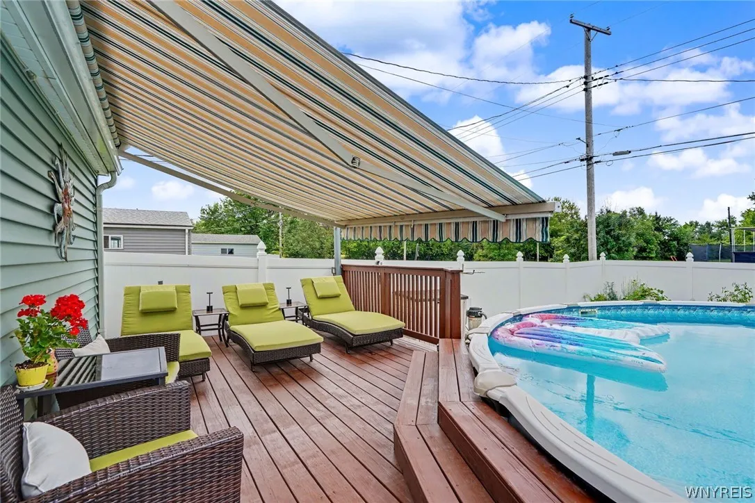 RECENT ADDED DECK TO POOL EDGE WITH CANVAS AWNING -
