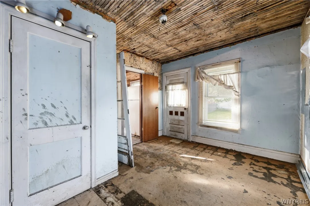 First floor bedroom off kitchen