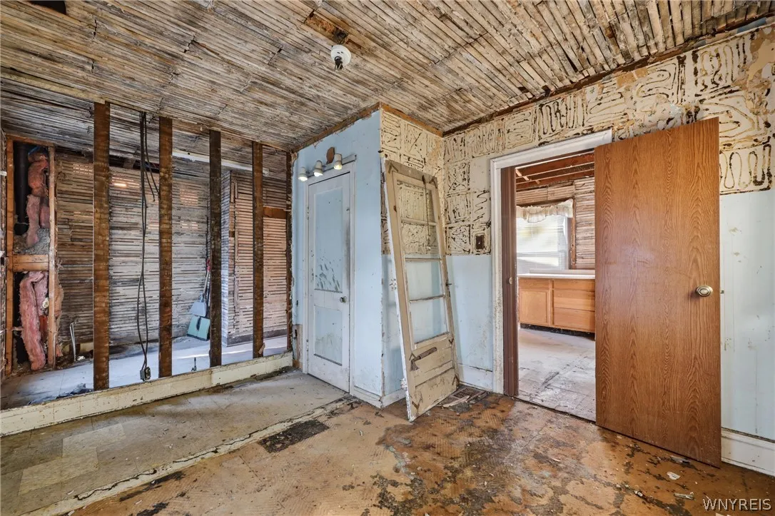 First floor bedroom off kitchen