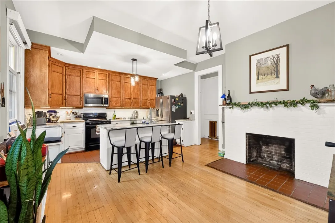 Huge eat-in kitchen with island & bar seating