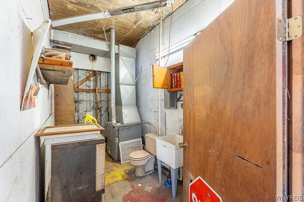 Bathroom, furnace, electrical box - Back Garage