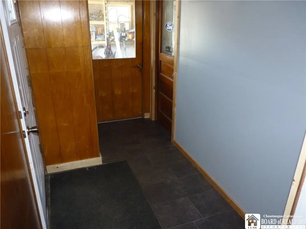 Interior foyer from driveway doorway