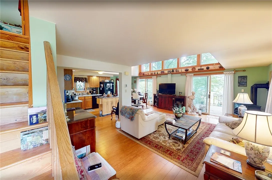 Upon entering you are greeted with a bright, open space with sliding doors leading to a spacious deck.