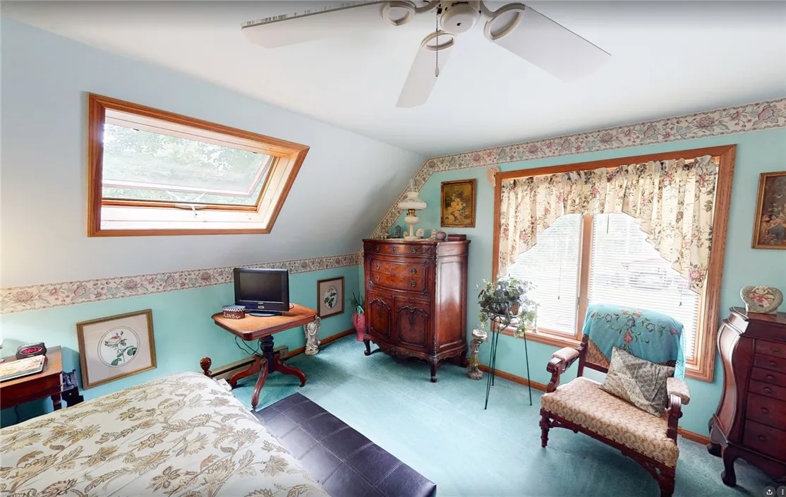 2nd Floor primary suite with skylights, wall to wall carpet, his and hers closets
