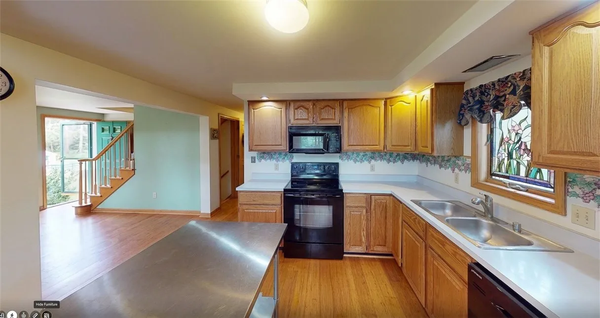 Lots of space in the kitchen. Portable Island stays.