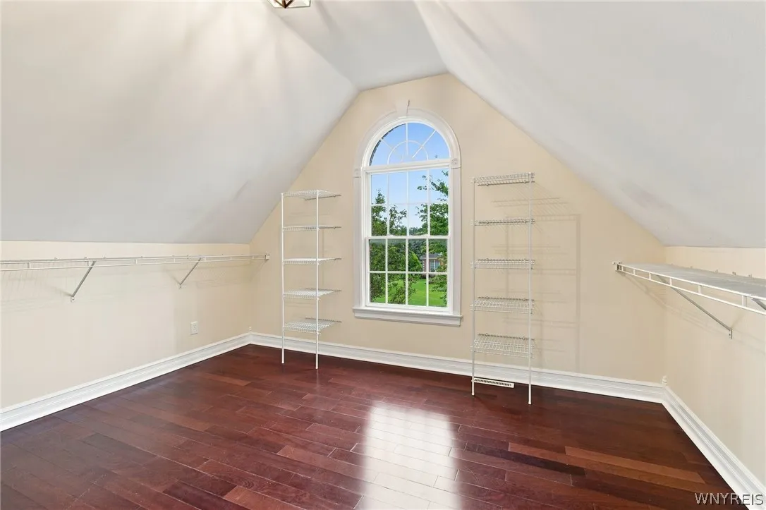 Primary bedroom walk-in closet