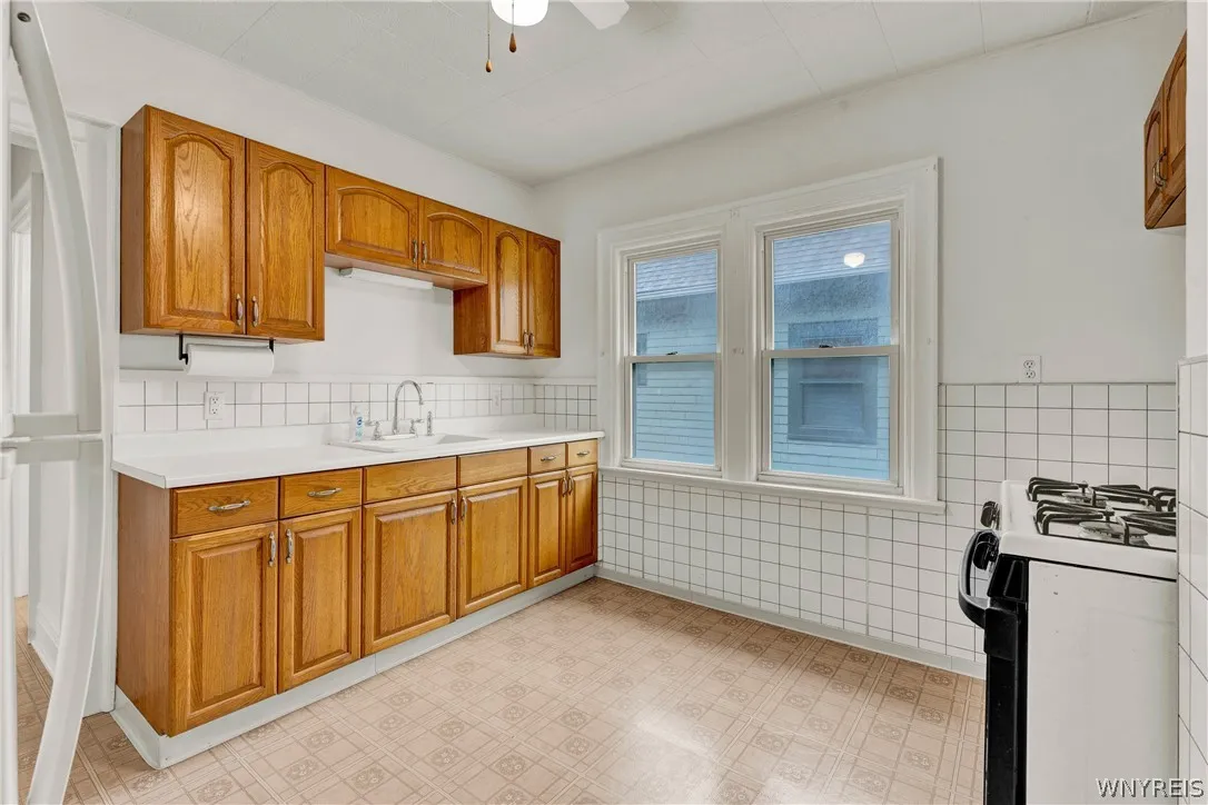Kitchen looking from back bedroom/ door