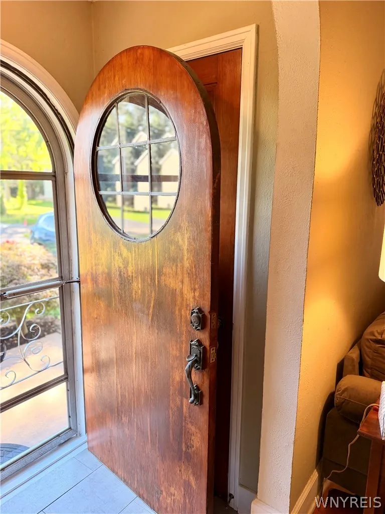 Curved entry door
