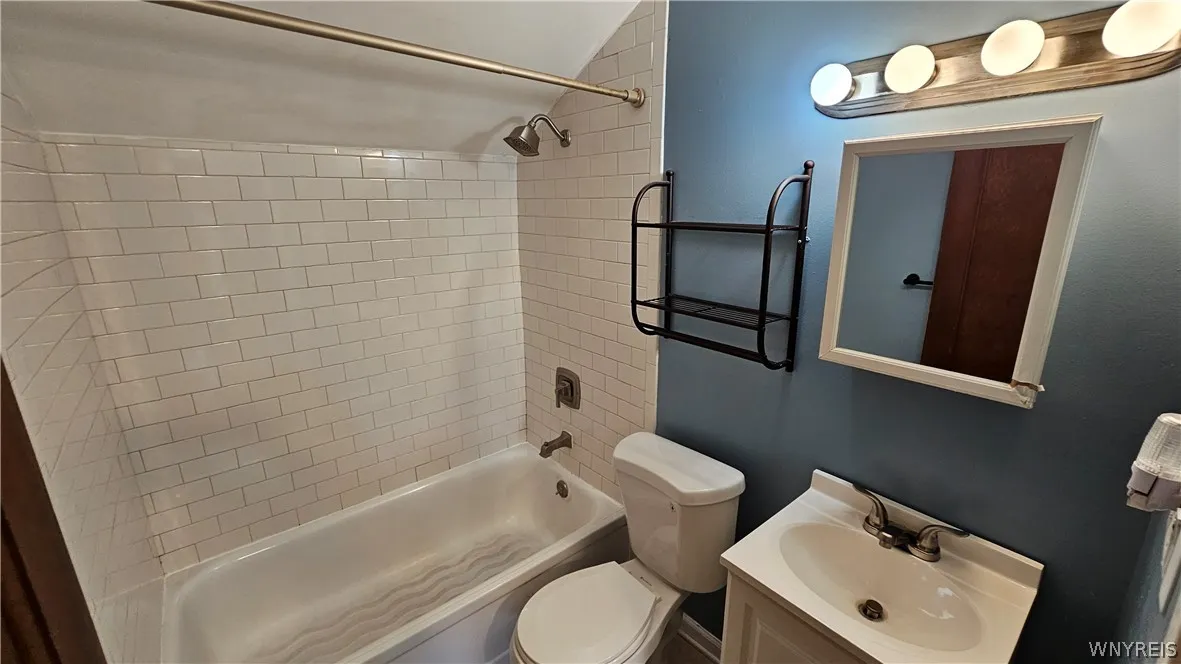 Full bathroom with shower in bathub on second floor