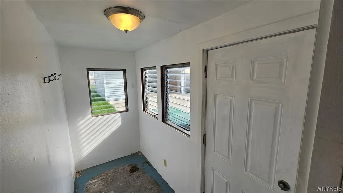 Rear entry vestibule