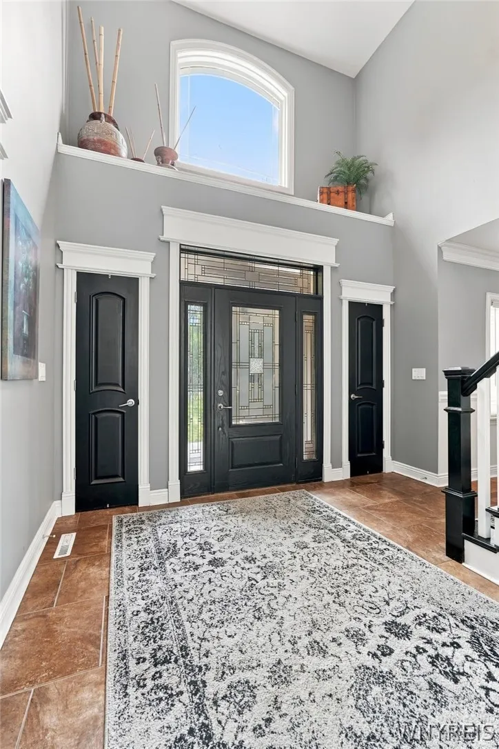 Perfectly inviting two story foyer