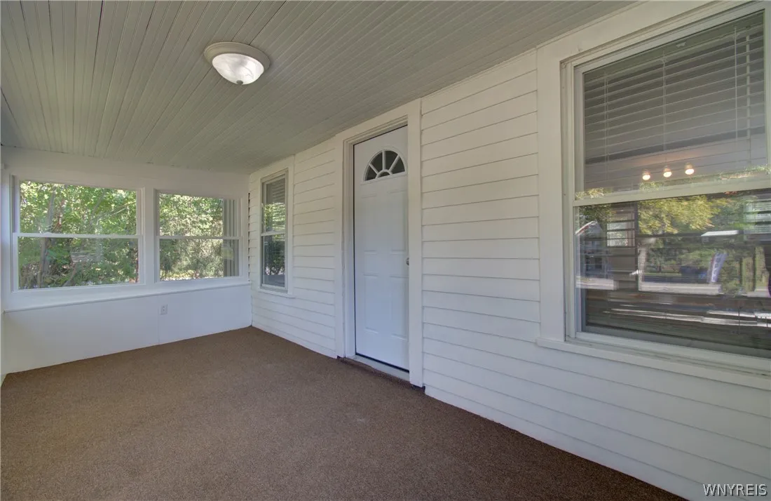 Front porch has access to both the house and the commercial space