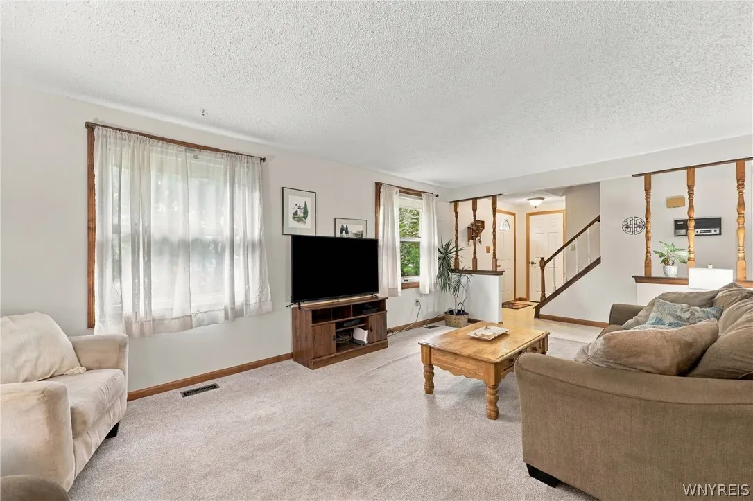 Living Open to Front Foyer with Coat Closet