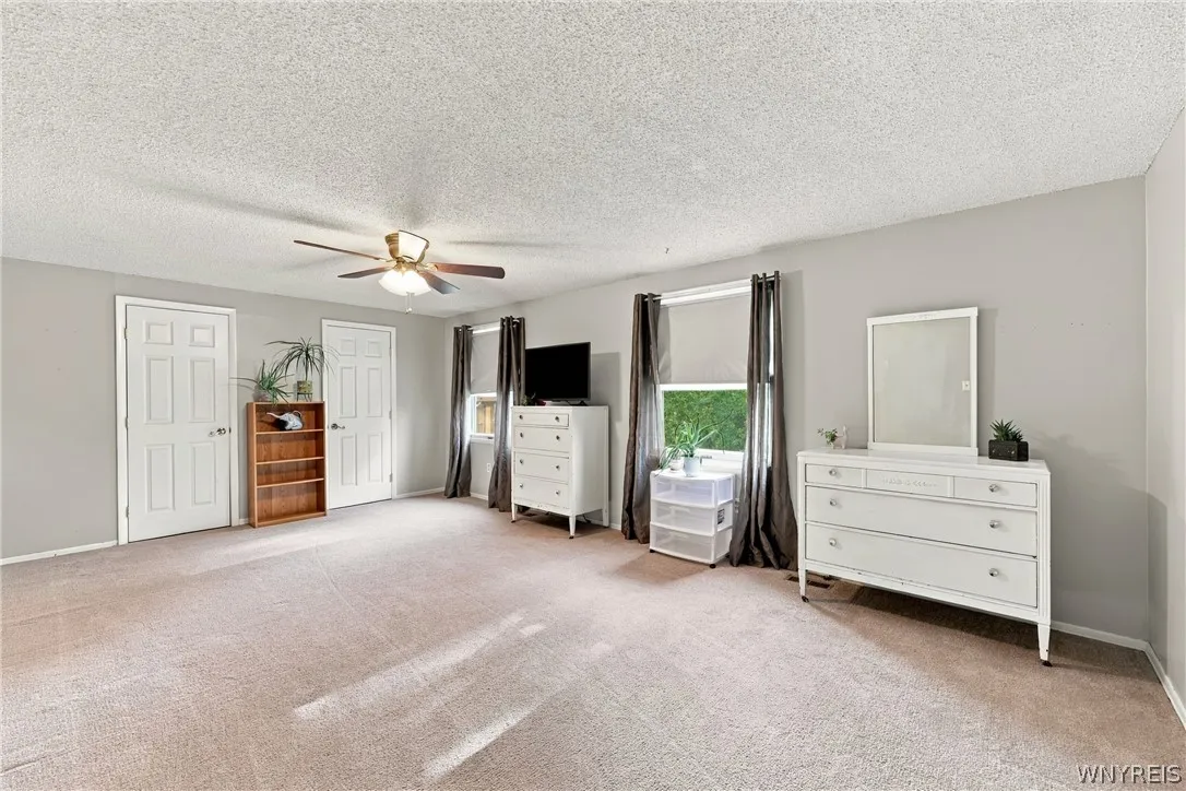 Bedroom with Full Wall of Closet Space