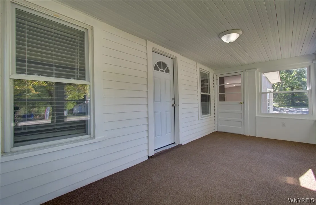 Front porch has access to both the house and the commercial space
