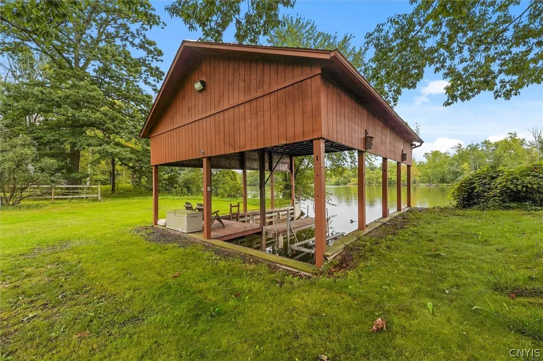 Boathouse with lift, also has a boat launch ramp